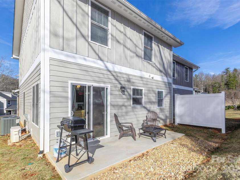 312 Jenna Clare Lane, Asheville, NC 28803.  MLS# CAR4197644, YatesRealty ID 15748. Back patio ready for grilling!