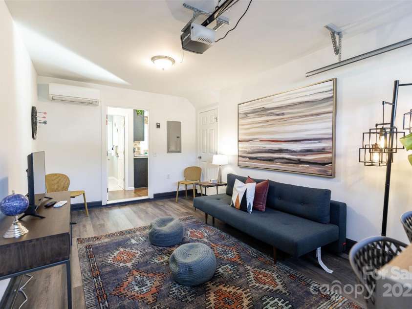 312 Jenna Clare Lane, Asheville, NC 28803.  MLS# CAR4197644, YatesRealty ID 15748. The garage is heated and air conditioned which adds +/- 180 SQ FT to this floor plan - perfect for a rec room or additional sleeping space.