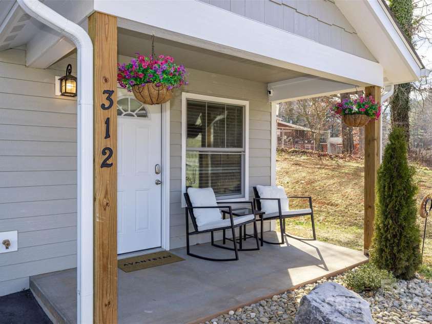 312 Jenna Clare Lane, Asheville, NC 28803.  MLS# CAR4197644, YatesRealty ID 15748. This 3 bed/3 bath newly-constructed townhome is located mere MINUTES from the Blue Ridge Parkway and ALL eclectic downtown Asheville has to offer.