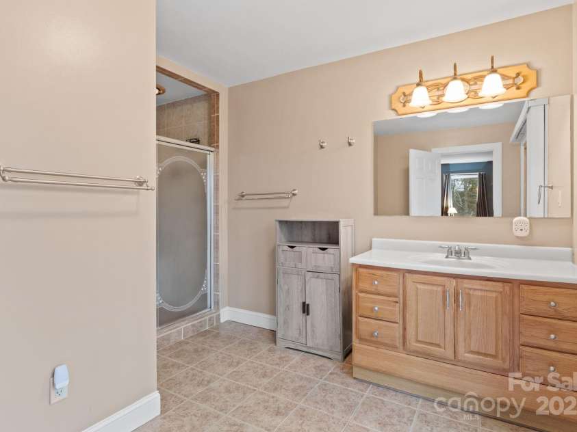 3670 Maple Creek Road, Rutherfordton, NC 28139.  MLS# CAR4247174, YatesRealty ID 15753. Primary Shower and Vanity
