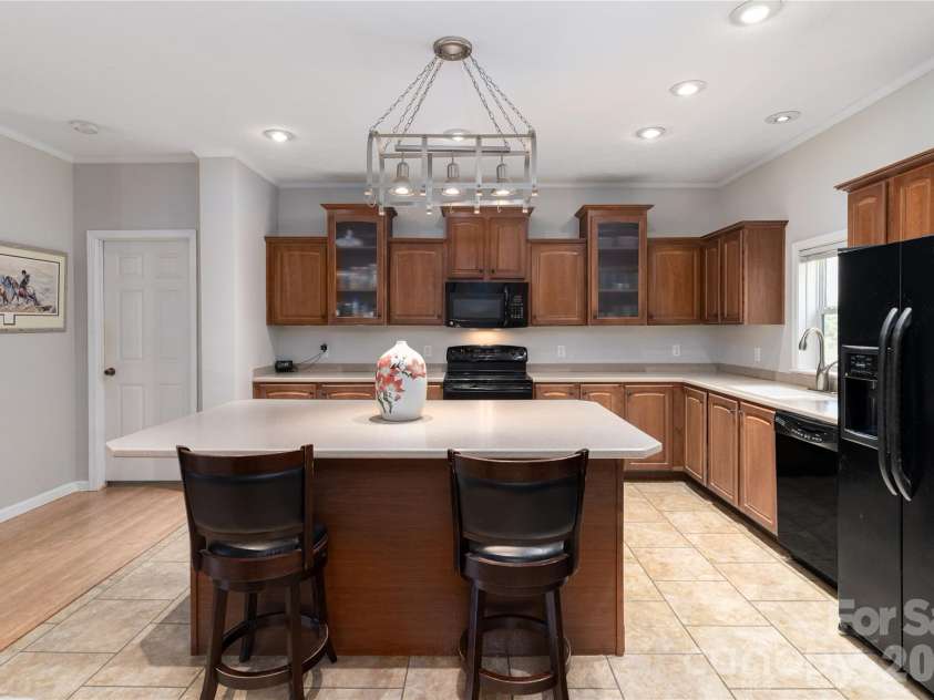 296 Stillwater Road, Troutman, NC 28166.  MLS# CAR4364244, YatesRealty ID 15754. Functional kitchen island