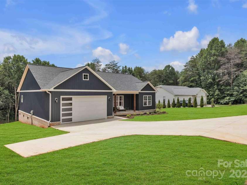 85 Cornerstone Drive, Taylorsville, NC 28681.  MLS# CAR4250711, YatesRealty ID 15756. Photo edited to show yard when grass is established