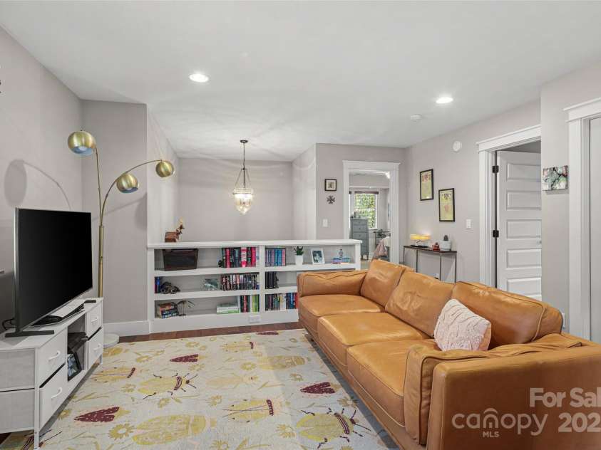 106 4th Street, Black Mountain, NC 28711.  MLS# CAR4252356, YatesRealty ID 15758. 2nd Level Living Room