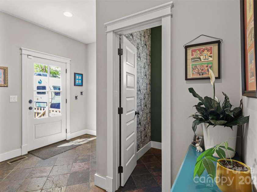 106 4th Street, Black Mountain, NC 28711.  MLS# CAR4252356, YatesRealty ID 15758. Back entrance/ mud room