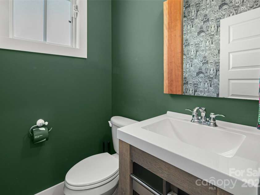 106 4th Street, Black Mountain, NC 28711.  MLS# CAR4252356, YatesRealty ID 15758. Half bath on Main