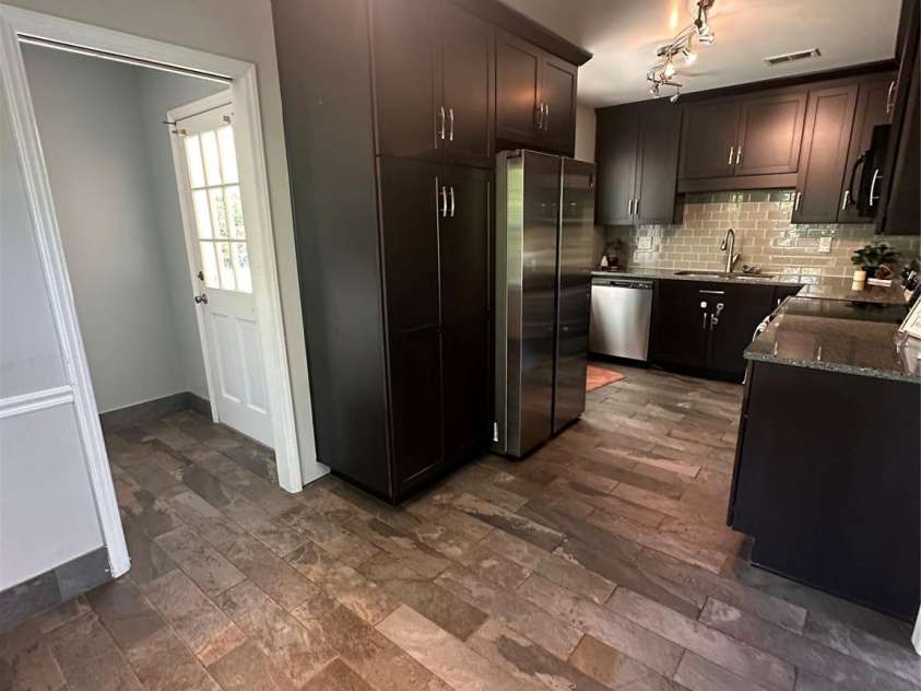 8004 Idlewild Road, Indian Trail, NC 28079.  MLS# CAR4350233, YatesRealty ID 15762. Kitchen Pantry With Roll Out Shelving