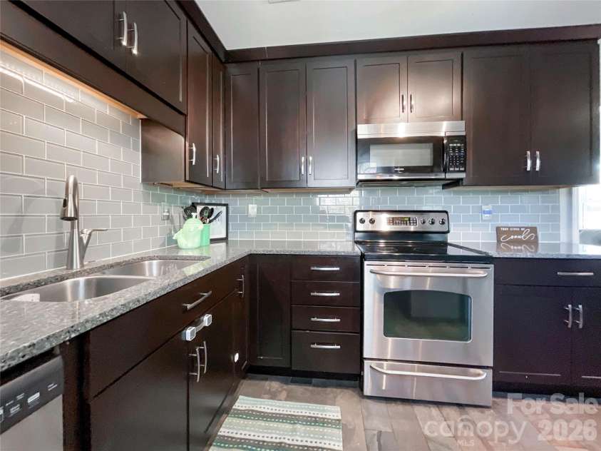 8004 Idlewild Road, Indian Trail, NC 28079.  MLS# CAR4350233, YatesRealty ID 15762. Kitchen With Soft Close Drawers 