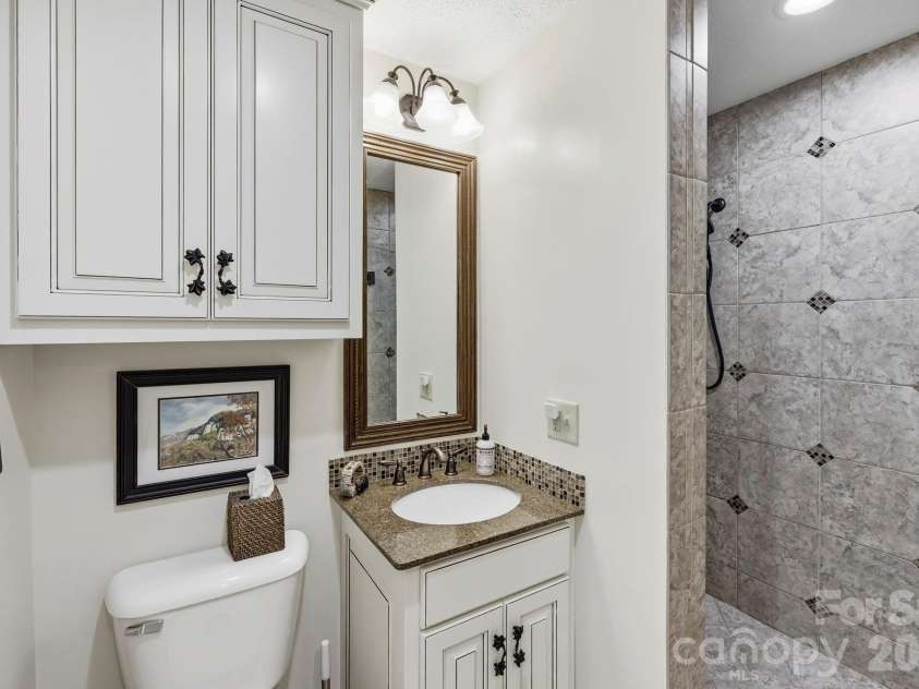 130 Edwards Point, Lake Lure, NC 28746.  MLS# CAR4369563, YatesRealty ID 15763. 