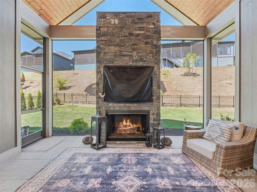 317 Avery Trail Drive, Arden, NC 28704.  MLS# CAR4373769, YatesRealty ID 15768. Screened Porch