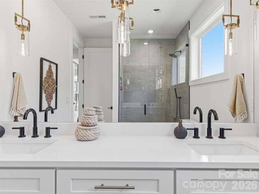 317 Avery Trail Drive, Arden, NC 28704.  MLS# CAR4373769, YatesRealty ID 15768. Shared Bath with Dual Vanity