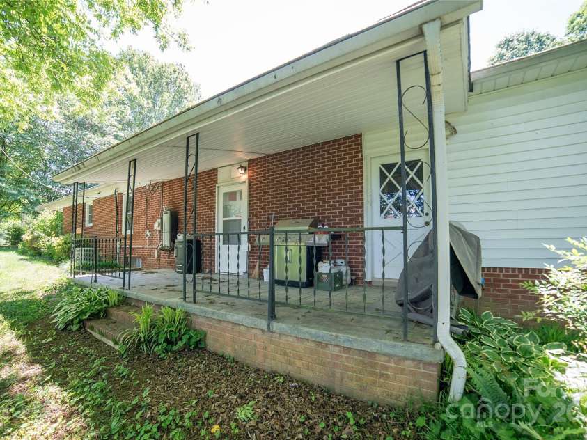 6487 OLD NC 18 Road, Connelly Springs, NC 28612.  MLS# CAR4263959, YatesRealty ID 15768. Covered rear porch