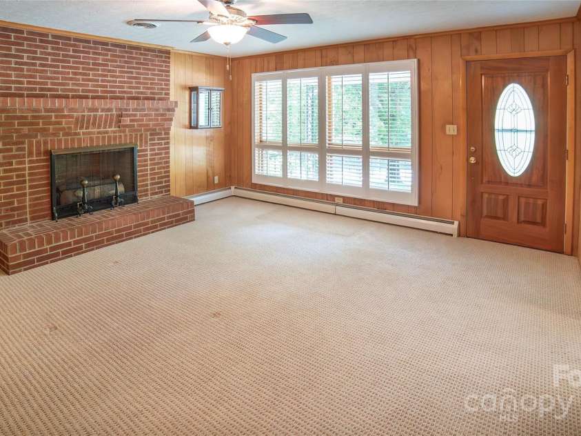 6487 OLD NC 18 Road, Connelly Springs, NC 28612.  MLS# CAR4263959, YatesRealty ID 15768. Livingroom with fireplace