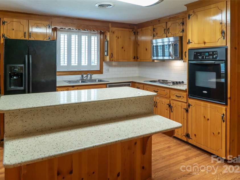 6487 OLD NC 18 Road, Connelly Springs, NC 28612.  MLS# CAR4263959, YatesRealty ID 15768. Work island with breakfast bar