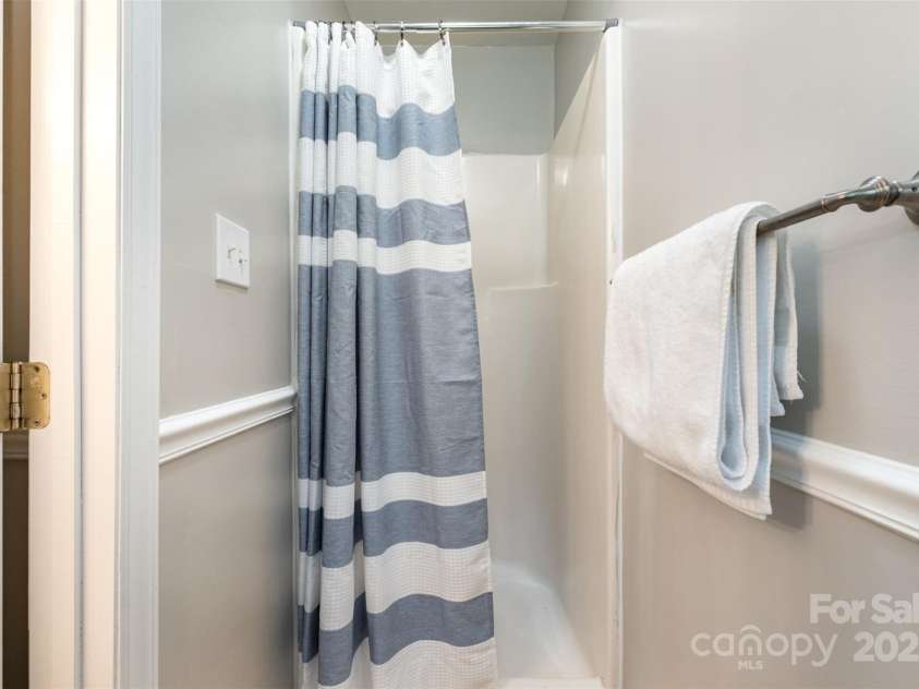 8544 Houston Ridge Road, Charlotte, NC 28277.  MLS# CAR4256177, YatesRealty ID 15774. Primary bathroom with step in shower.