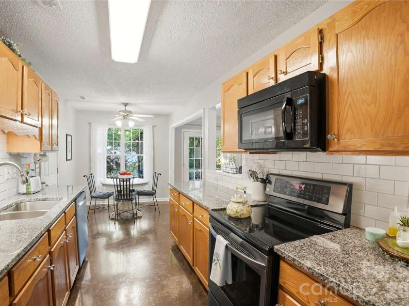 905 Matthews School Road, Matthews, NC 28105.  MLS# CAR4372226, YatesRealty ID 15774. 