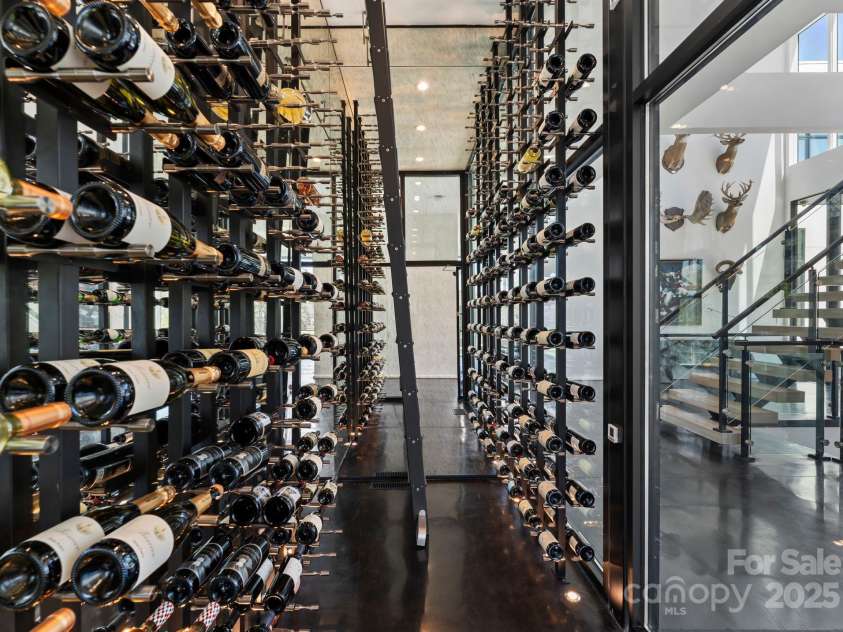 4817 Carmel Park Drive, Charlotte, NC 28226.  MLS# CAR4286044, YatesRealty ID 15775. Wine Room
