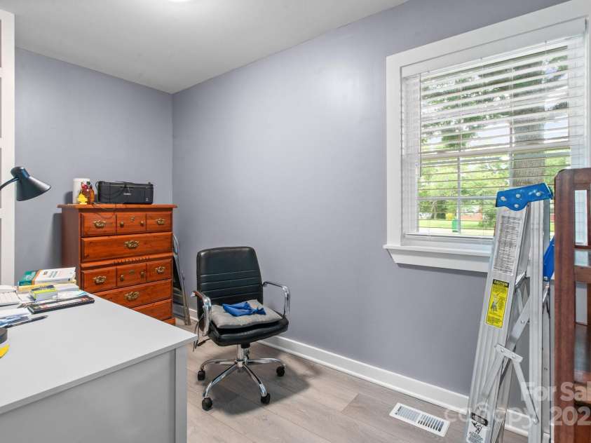 806 Central Avenue, Locust, NC 28097.  MLS# CAR4259059, YatesRealty ID 15776. Owners En Suite Office