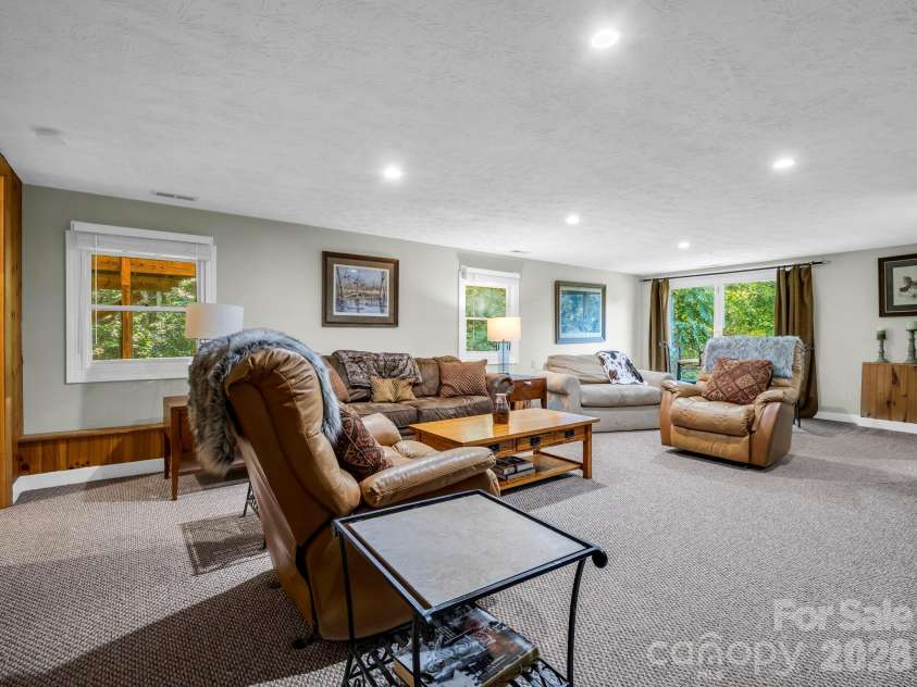 382 First Broad Drive, Bostic, NC 28018.  MLS# CAR4403241, YatesRealty ID 15777. Lower level Great Room