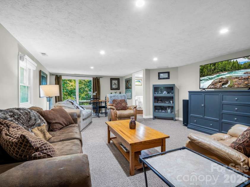 382 First Broad Drive, Bostic, NC 28018.  MLS# CAR4403241, YatesRealty ID 15777. Lower Level Great Room