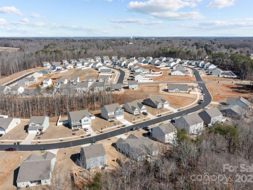 127 Tradesmen Trail, Troutman, NC 28166.  MLS# CAR4223474, YatesRealty ID 15779. Located in a friendly neighborhood, residents can enjoy nearby amenities and the charm of Troutman, making it an excellent choice for those new to the area.This property combines modern living with a welcoming community