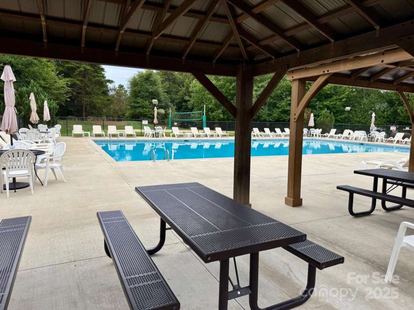 1465 Porters Court, Concord, NC 28025.  MLS# CAR4255196, YatesRealty ID 15791. Community pool located right next to the house.