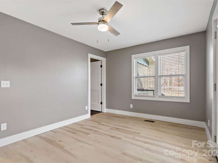 150 Westerman Street, Old Fort, NC 28762.  MLS# CAR4219635, YatesRealty ID 15793. Bedroom offers an en suite bathroom.