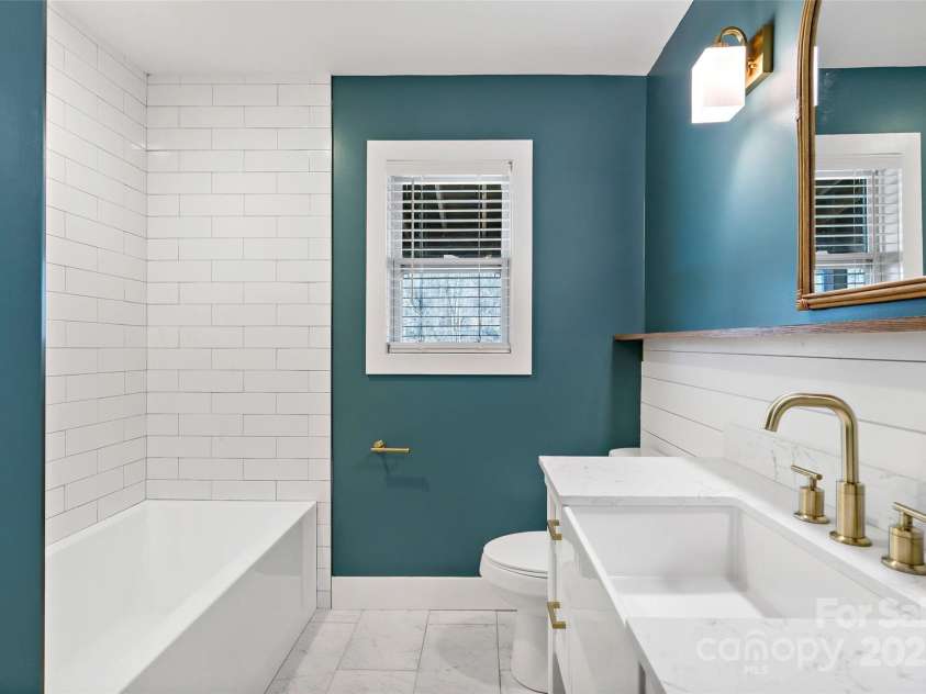 150 Westerman Street, Old Fort, NC 28762.  MLS# CAR4219635, YatesRealty ID 15793. Full bathroom located in the hallway.