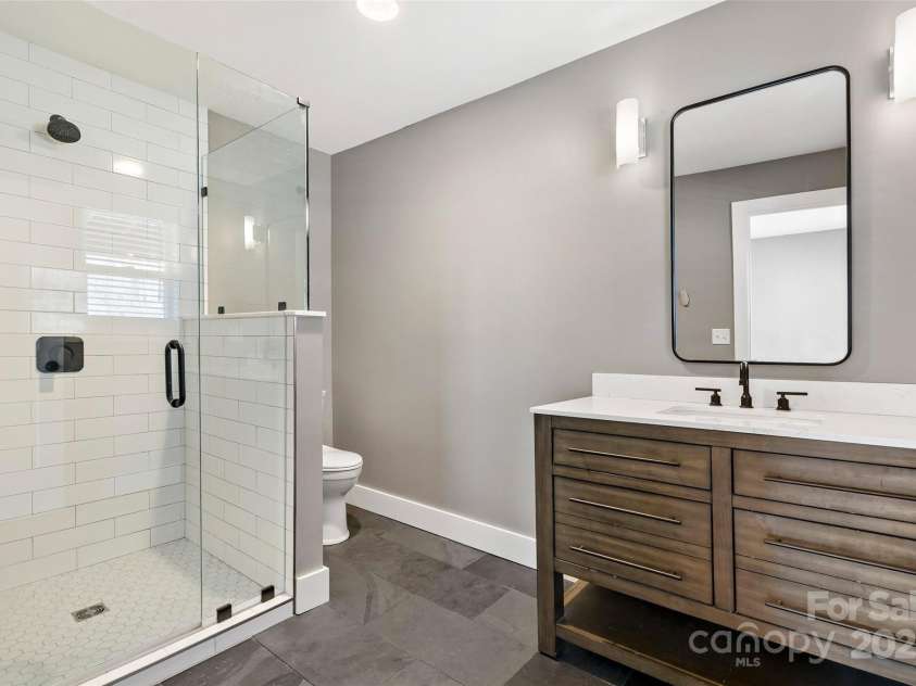 150 Westerman Street, Old Fort, NC 28762.  MLS# CAR4219635, YatesRealty ID 15793. Walk in shower