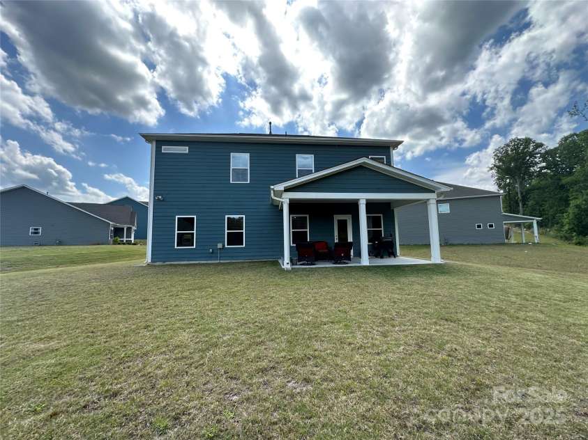 348 Ox Bow Circle, Mount Holly, NC 28120.  MLS# CAR4256386, YatesRealty ID 15794. Covered Patio