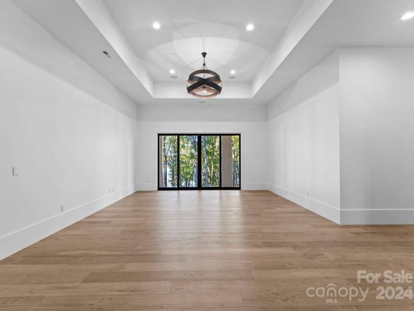 13702 Sage Thrasher Lane, Charlotte, NC 28278.  MLS# CAR4191491, YatesRealty ID 158. Lower Level Great Room