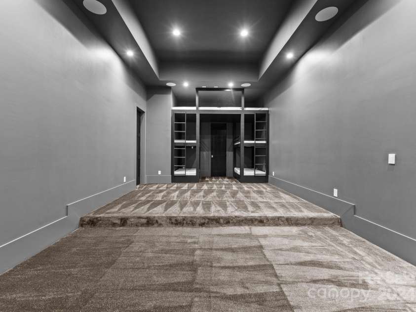13702 Sage Thrasher Lane, Charlotte, NC 28278.  MLS# CAR4191491, YatesRealty ID 158. Lower Level Theater Room