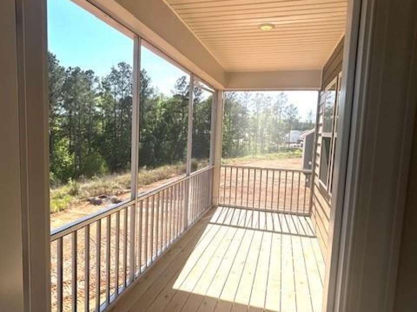 4329 Camden Glen Road, Lancaster, SC 29720.  MLS# CAR4358955, YatesRealty ID 15811. Screened in back deck