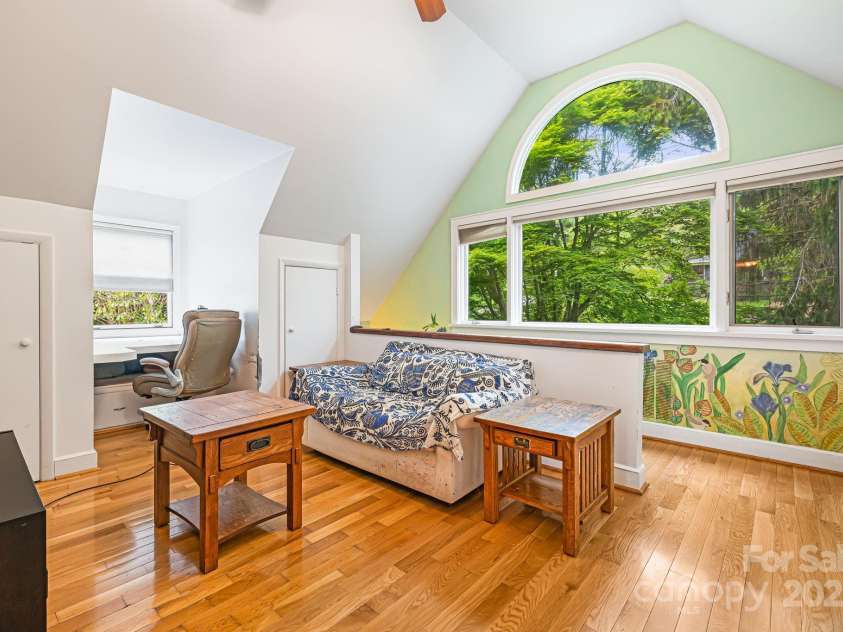 95 Carter Cove Road, Asheville, NC 28804.  MLS# CAR4254305, YatesRealty ID 15814. Light filled loft space