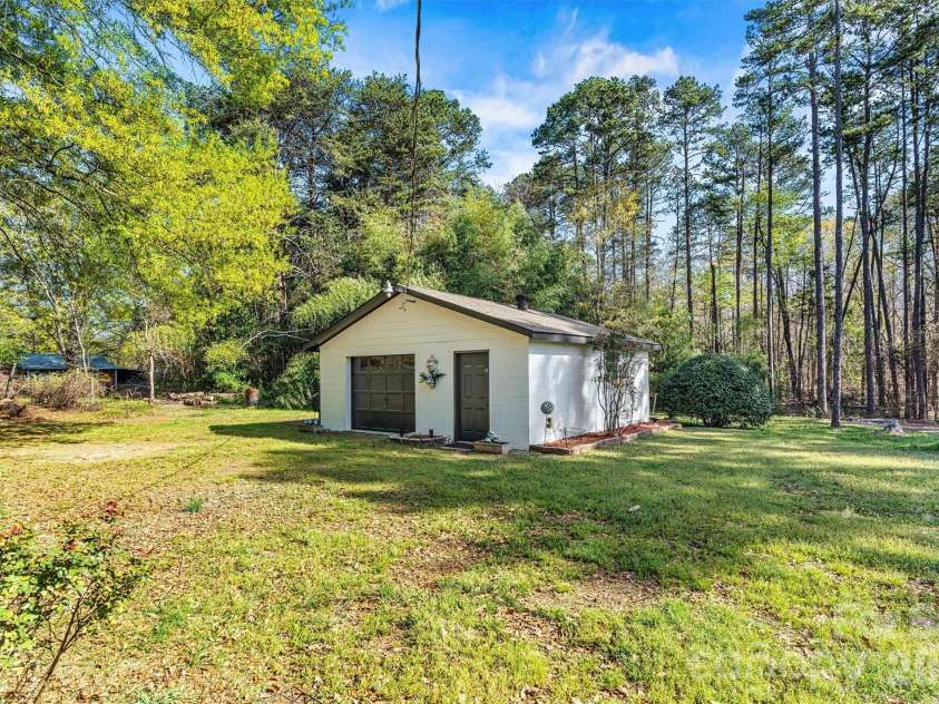 5329 Highway 27 Highway, Iron Station, NC 28080.  MLS# CAR4363221, YatesRealty ID 15820. Detached workshop with power