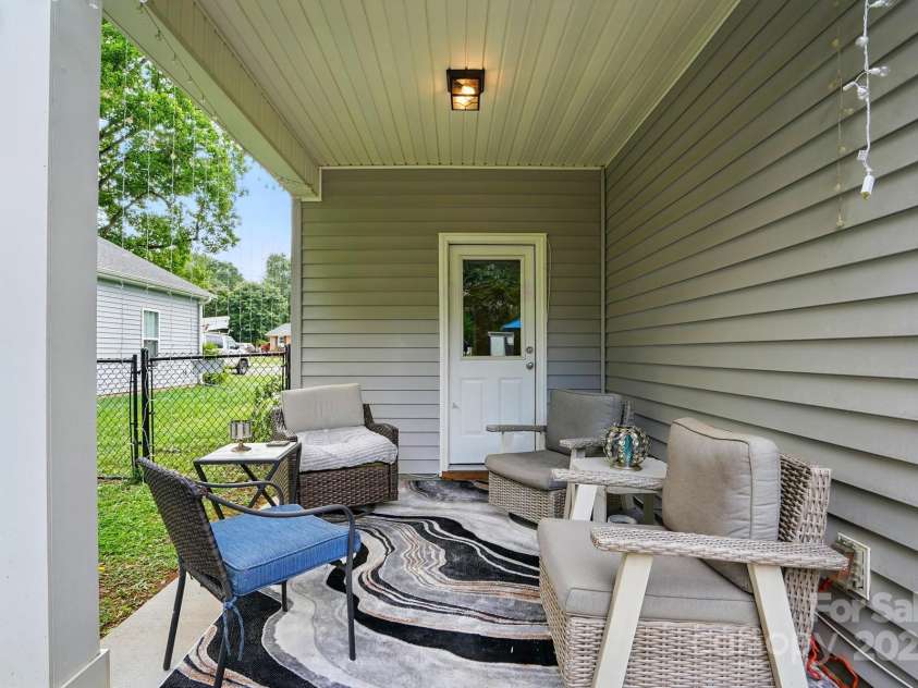 204 Craig Street, Mount Holly, NC 28120.  MLS# CAR4263380, YatesRealty ID 15826. Covered Patio
