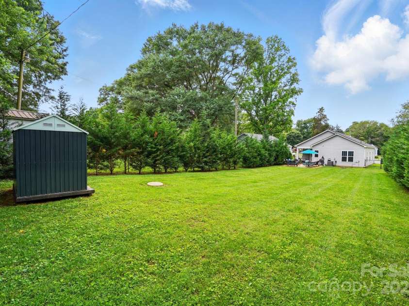 204 Craig Street, Mount Holly, NC 28120.  MLS# CAR4263380, YatesRealty ID 15826. Fenced in Backyard - Privacy Trees Added