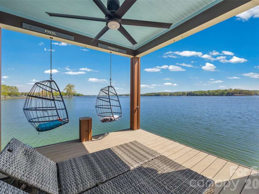 5280 Masons Ferry Road, Clover, SC 29710.  MLS# CAR4366323, YatesRealty ID 15826. Custom Dock with Hanging Chairs