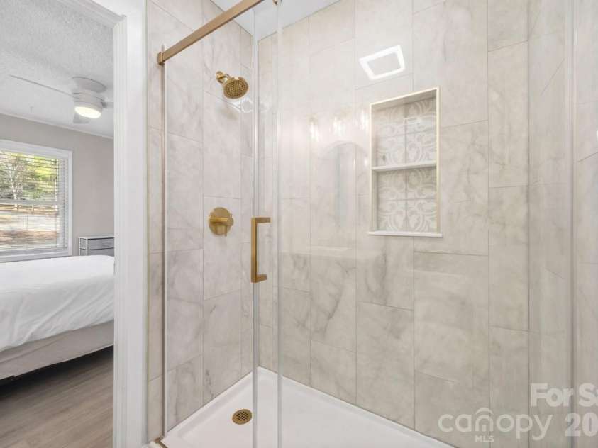 5280 Masons Ferry Road, Clover, SC 29710.  MLS# CAR4366323, YatesRealty ID 15826. Custom Floor to Ceiling Tile Shower #1