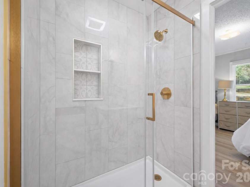 5280 Masons Ferry Road, Clover, SC 29710.  MLS# CAR4366323, YatesRealty ID 15826. Custom Floor to Ceiling Tile Shower #2