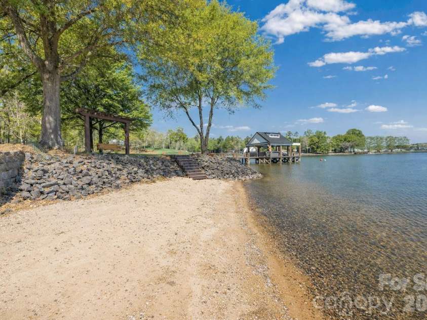 5280 Masons Ferry Road, Clover, SC 29710.  MLS# CAR4366323, YatesRealty ID 15826. Private Sandy Beach with main channel views
