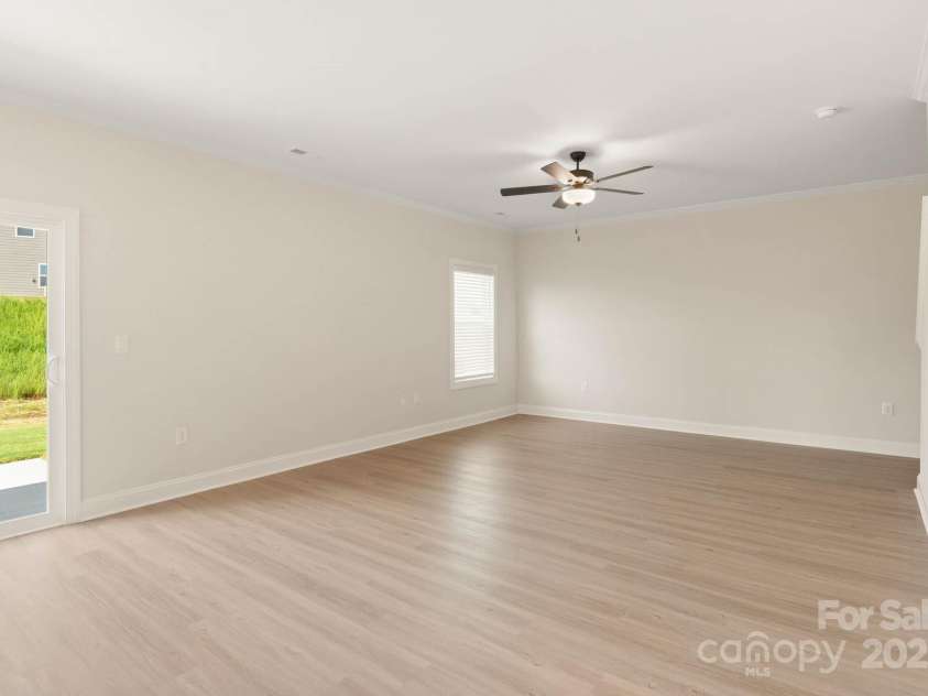 142 Jacobs Hill Place, Troutman, NC 28166.  MLS# CAR4241802, YatesRealty ID 15834. Family room