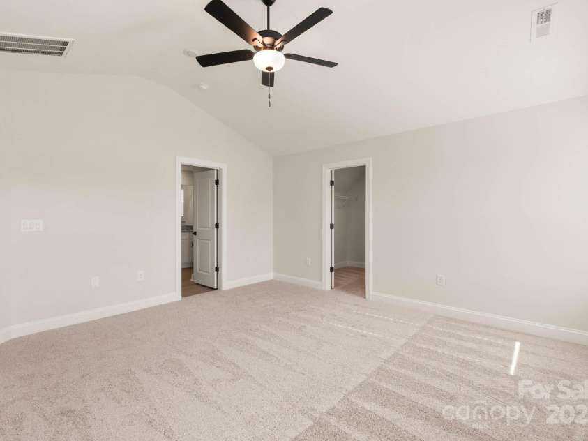 142 Jacobs Hill Place, Troutman, NC 28166.  MLS# CAR4241802, YatesRealty ID 15834. Master bedroom