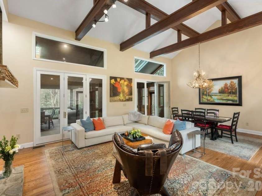 174 Garnet Rock Trail, Highlands, NC 28741.  MLS# CAR4365412, YatesRealty ID 15834. Living Room & Dining Area