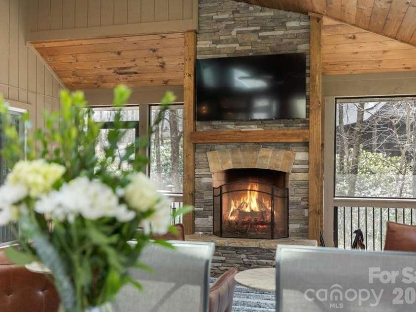 174 Garnet Rock Trail, Highlands, NC 28741.  MLS# CAR4365412, YatesRealty ID 15834. Wood burning fireplace.