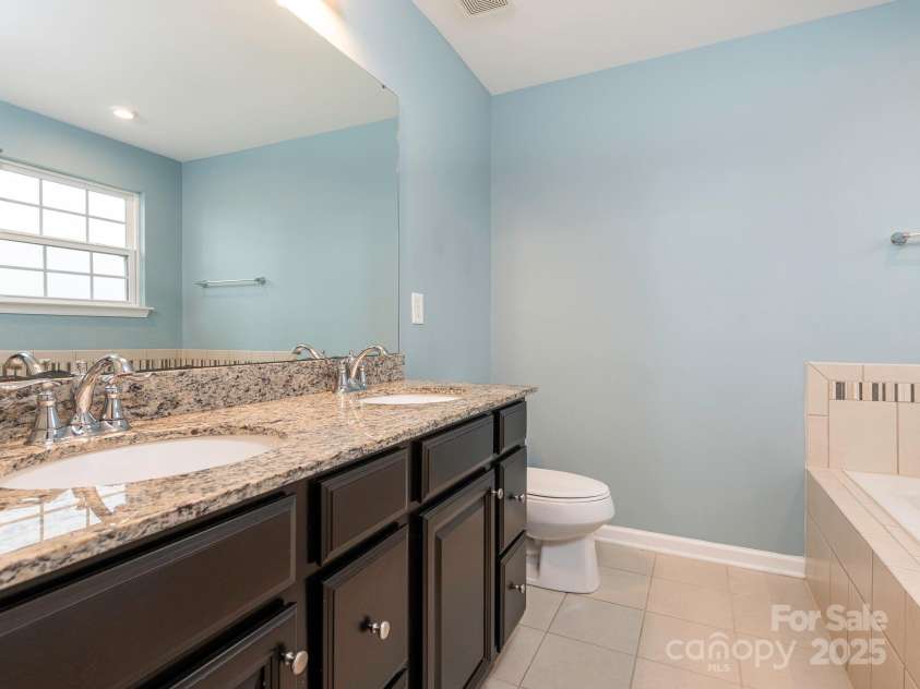 1707 Scarbrough Circle, Concord, NC 28025.  MLS# CAR4287048, YatesRealty ID 1584. Primary Bathroom
