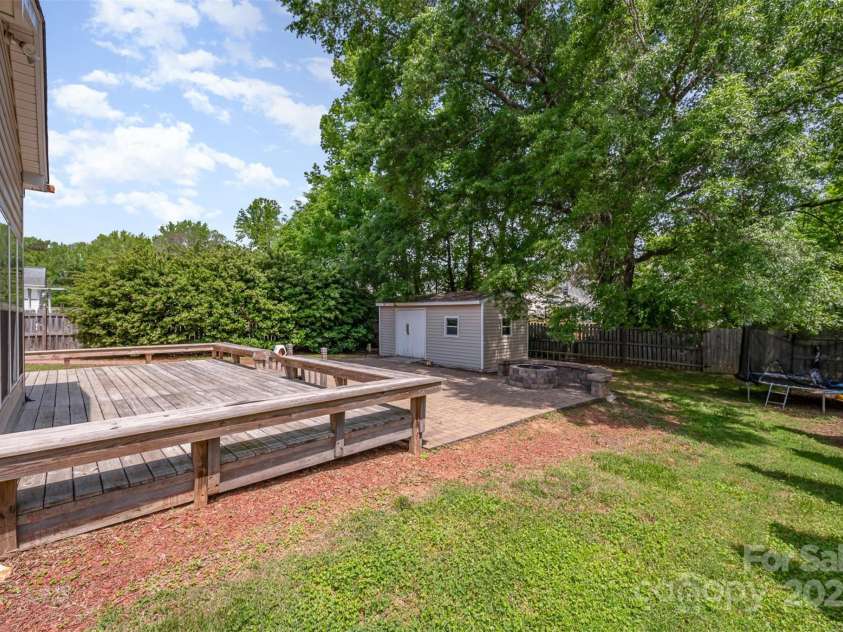 618 Circle Trace Road, Monroe, NC 28110.  MLS# CAR4245604, YatesRealty ID 15842. Backyard and patio