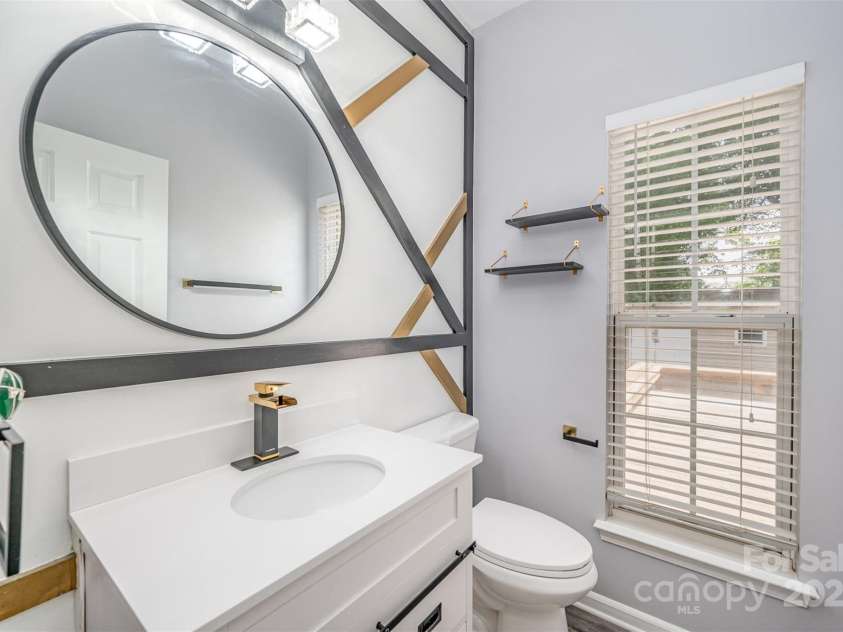 618 Circle Trace Road, Monroe, NC 28110.  MLS# CAR4245604, YatesRealty ID 15842. Main level half bath