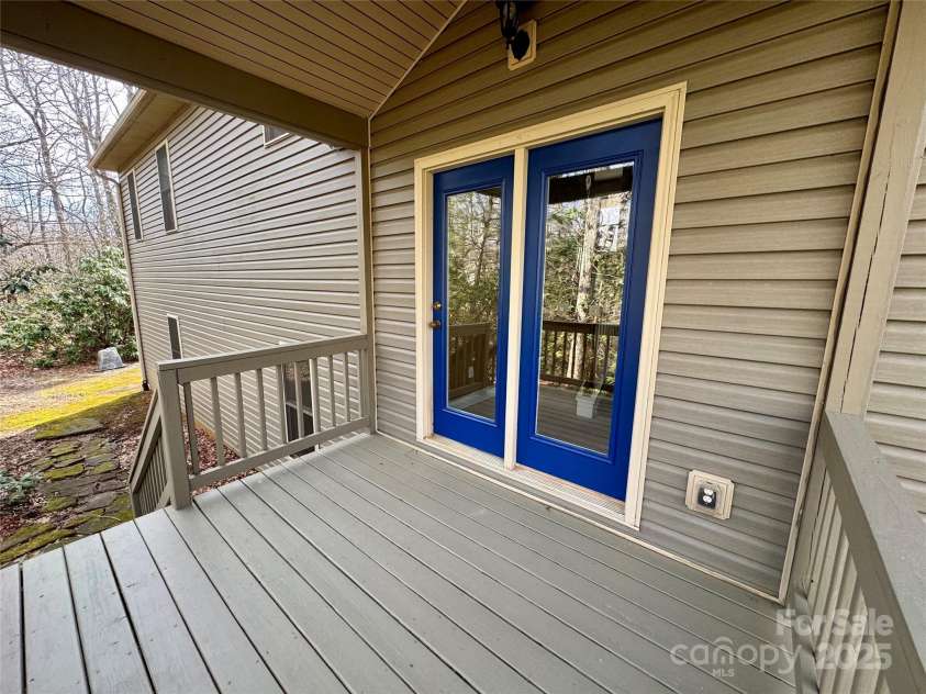 180 Dalton Lane, Black Mountain, NC 28711.  MLS# CAR4245129, YatesRealty ID 15847. Covered back deck