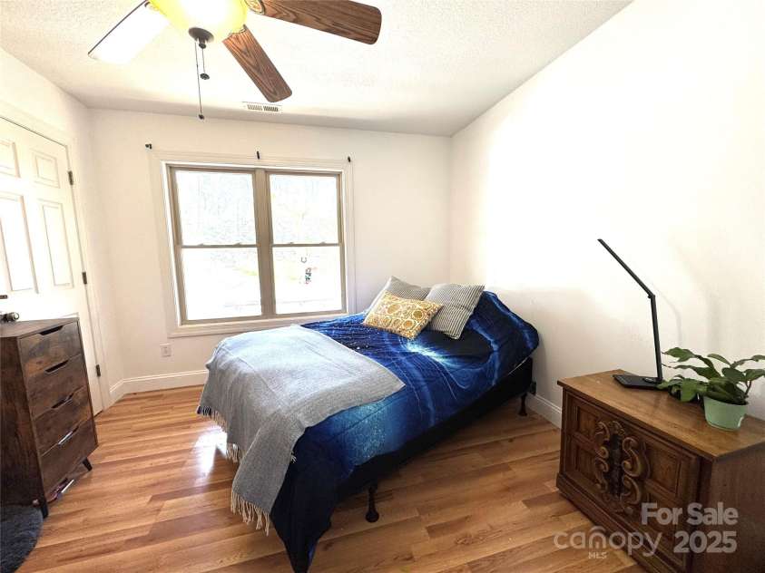 180 Dalton Lane, Black Mountain, NC 28711.  MLS# CAR4245129, YatesRealty ID 15847. Lower level bedroom