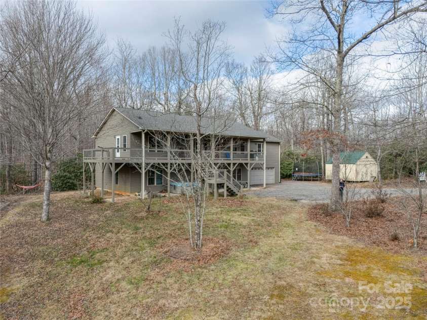180 Dalton Lane, Black Mountain, NC 28711.  MLS# CAR4245129, YatesRealty ID 15847. Room to roam; level yard for play